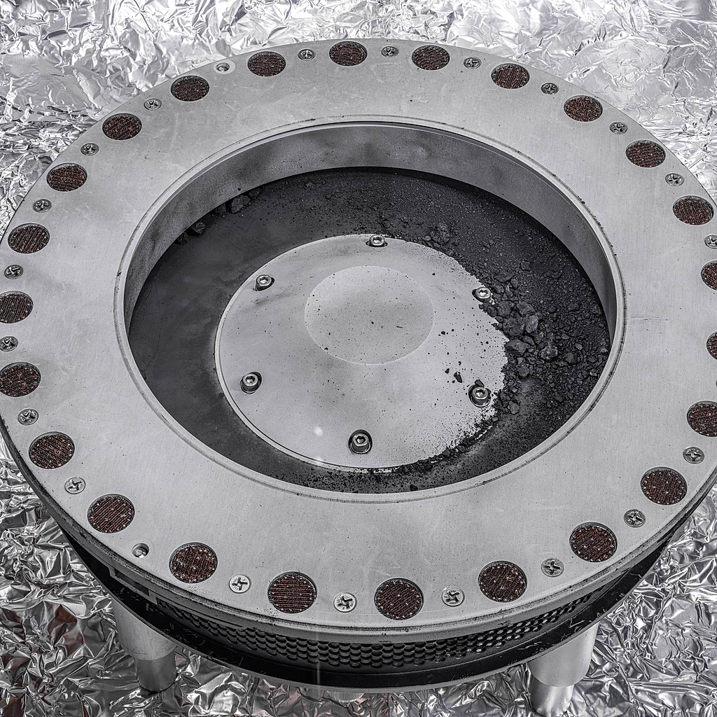 This shows the OSIRIS-REx sample collector with material taken from Bennu.